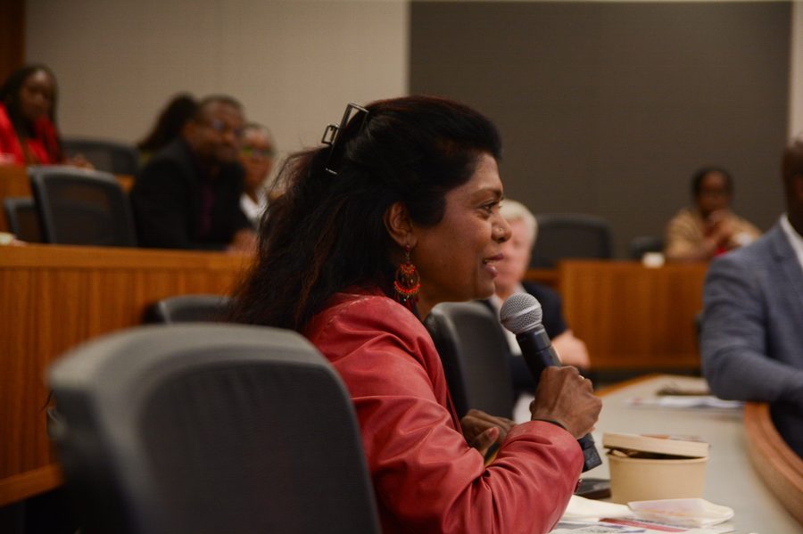 Professional woman speaking at forum